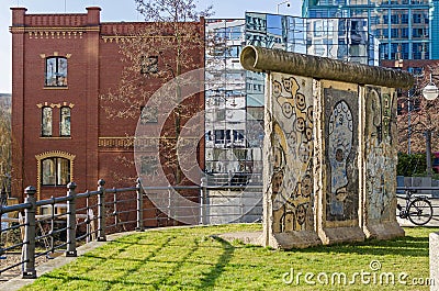 Spree-Bogen with the building of the Ernst-Freiberger foundation and a part of the Berlin Wall Editorial Stock Photo