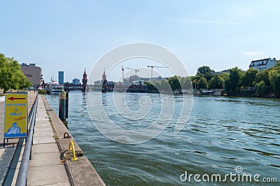 Spree river in berlin with Oberbaum Bridge in background. Editorial Stock Photo