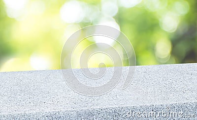 Spring background.Empty diagonal pebble stone table with blur tree in garden boekh background,banner mockup template for display Stock Photo