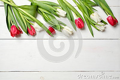 Spring background, tulips on top on white wooden desk, greeting card template for Womens or Mothers Day, banner mockup with copy s Stock Photo