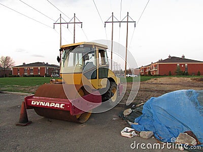 Spring cleaning. Roller on parking lot in Sayreville, NJ, USA. Editorial Stock Photo