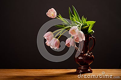 Spring decoration. Pink tulips in a vase Stock Photo