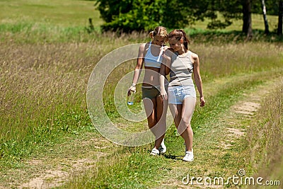 Spring - Female couple walking in nature Stock Photo