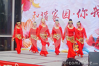 Shenzhen, China: 2019 Community Spring Festival Gala with women dancing and people watching Editorial Stock Photo