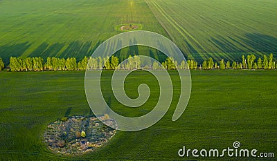 Spring fields, long shadows from landings at sunset from the quadrocopter Stock Photo