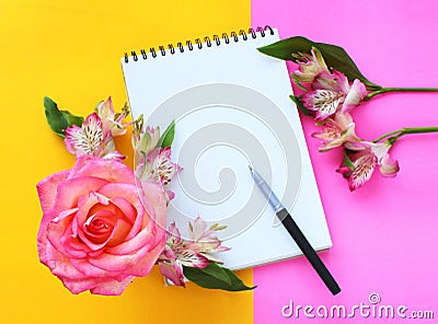 Spring flower arrangement in yellow and bright pink tones. Stock Photo