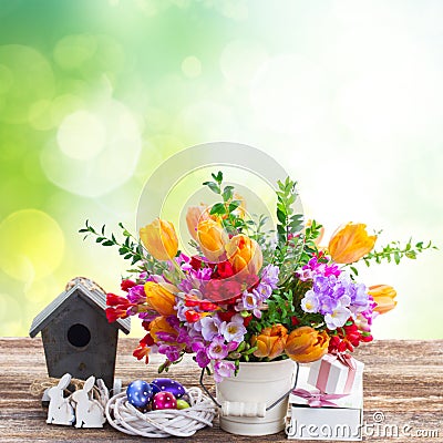 Spring flowers with easter eggs Stock Photo