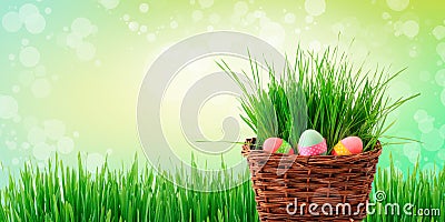 Spring green abstract wallpaper background with brown knitted basket with easter eggs Stock Photo