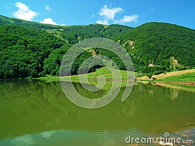 A lake in green highlands of Alborz mountain , Iran Stock Photo