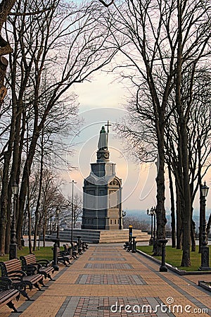 Spring morning landscape view of the Monument of Volodymyr The Great. Straight stone walkway in the park. Saint Vladimir Hil Editorial Stock Photo