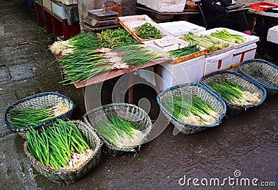 Spring onions stall Yichang Market, China Editorial Stock Photo