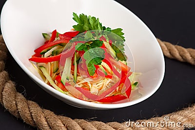 Spring salad with paprika, cucumber and cabbage Stock Photo