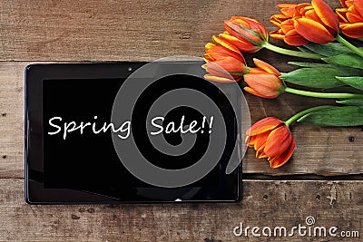 Spring Sale Tablet and Tulips Stock Photo