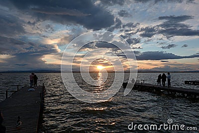 Spring sunset from the old wooden jetty Editorial Stock Photo