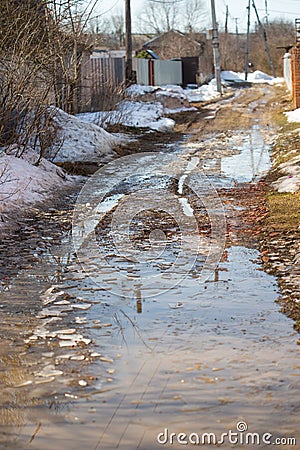 Spring thaw in the villages, the roads are blurred with mud Stock Photo