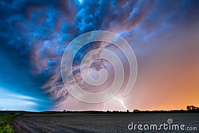 A Spring Thunderstorm at Sunset Stock Photo