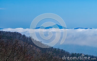 A Spring View of Devils Backbone and Valley Clouds Stock Photo