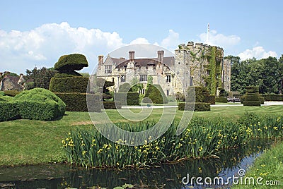 Spring view of a garden at a riverside. Hever castle, England Stock Photo