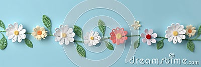 Springtime Crochet Banner with Flowers on Light Blue Background for Celebrations and Cards, generative AI Stock Photo
