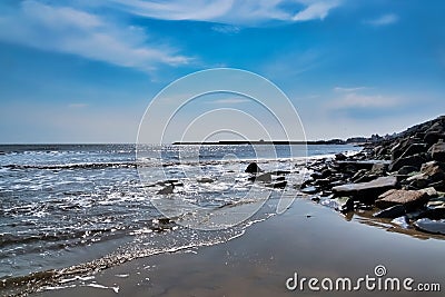 Sparkling Seas On An Ebbing Tide - Lyme Regis Stock Photo