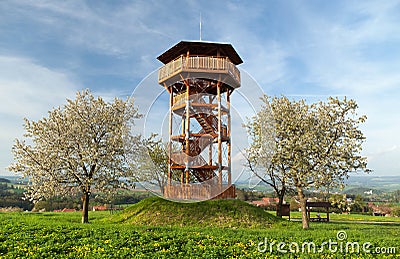 Springtime view, looking tower and flowering cherry trees Stock Photo