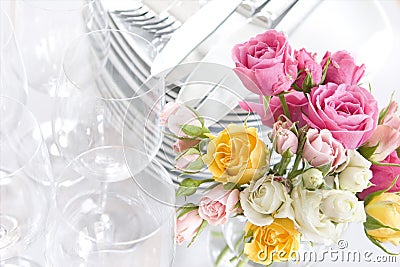 Springtime or wedding buffet dishes and roses Stock Photo