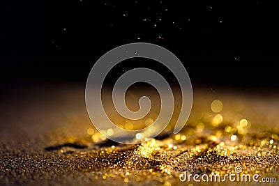 Sprinkle gold dust glitter Stock Photo