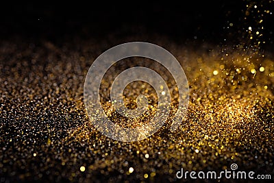 Sprinkle gold dust on a black background Stock Photo