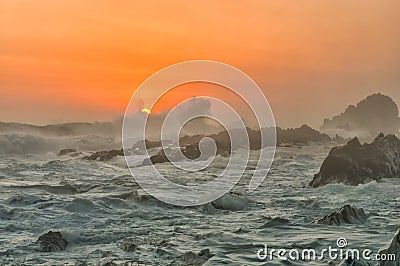 Spume in the setting sun Stock Photo