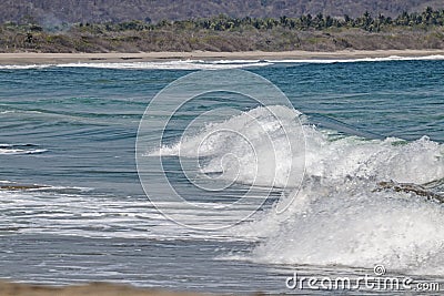 Spume waves going to the mexican pacific ocean beach Stock Photo
