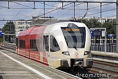 Spurt GTW diesel local commuter train operated by Arriva is leaving station Apeldoorn Editorial Stock Photo