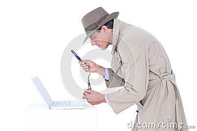 Spy looking through magnifier Stock Photo