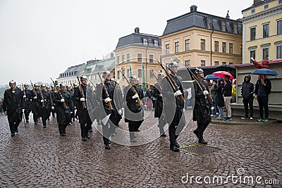 A squad of royal guardsmen on the march. Stockholm Editorial Stock Photo