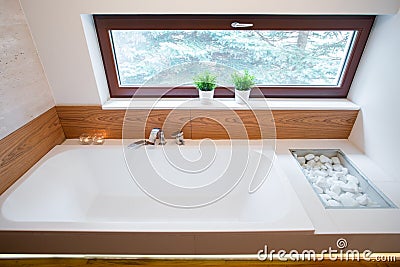 Square bathtub with simple tap Stock Photo