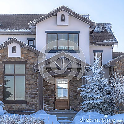 Square crop Facade of a home nestled at the residential community of Wasatch Mountains Stock Photo