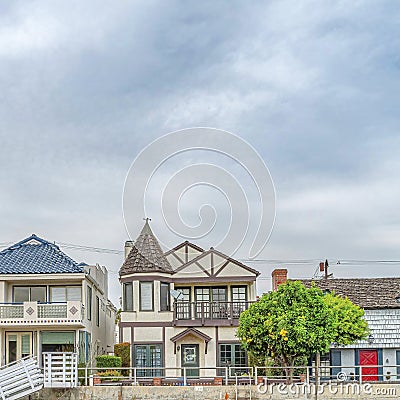 Square Elegant houses overlooking public canal with walkways in Long Beach California Editorial Stock Photo