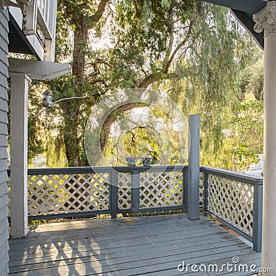 Square frame Exiting the front door of a wonderful cottage home near sunset Stock Photo