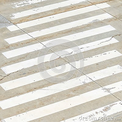 Square frame Pedestrian crossing white lines painted on the road in front of building Stock Photo