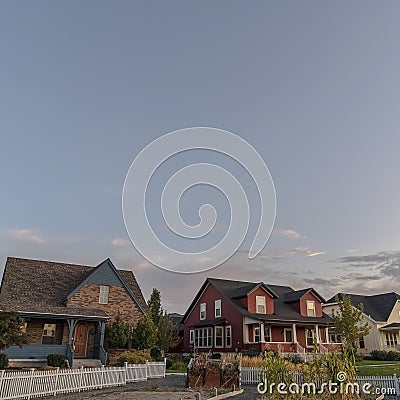 Square frame Three homes on a modern housing estate Stock Photo