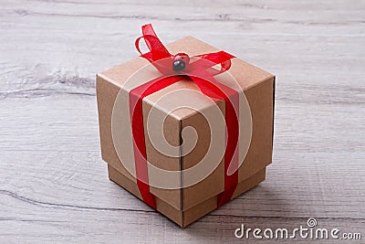 Square gift box with ribbon. Stock Photo