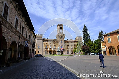 square of Giuseppe Verdi across the building of the theater and tower clock in Busseto, Italy Editorial Stock Photo