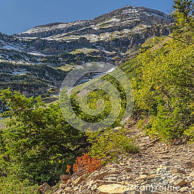 Square Hiking trail on Mount Tompanogos, Utah with snow Stock Photo