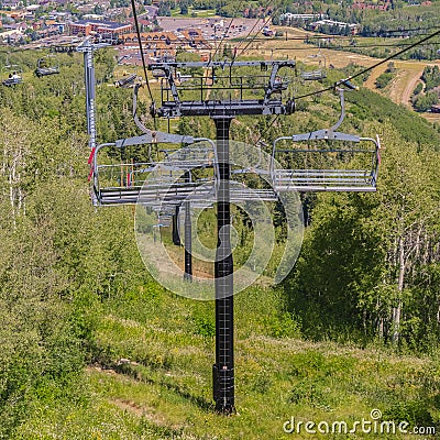 Square Hiking trails and buildings in Park City viewed from chairlifts at off season Stock Photo