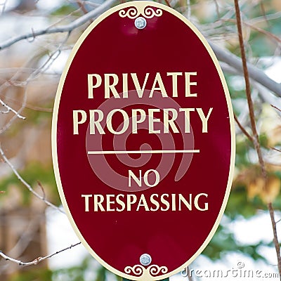 Square Oval shape Private Property No Trespassing sign with red and white colors Stock Photo