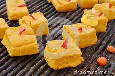 Polenta pieces grilled on embers Stock Photo