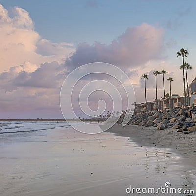 Square Puffy clouds at sunset Panoramic view of the beach at Oceanside in California during su Stock Photo