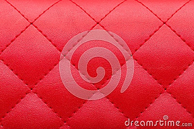 Square red leather pattern stitched with thread seam. Stock Photo