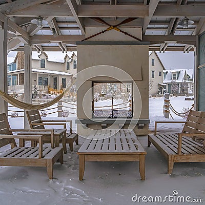 Square Seating on the snowy patio of a clubhouse in Utah Stock Photo