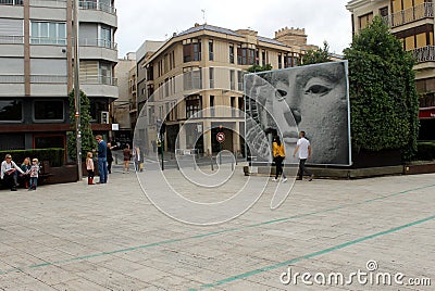 A square where there is a street mosaic with the image of the Iberian sculpture that is called `The Lady of Elche` Editorial Stock Photo