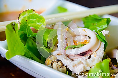 Squid boiled with spicy sauce Stock Photo